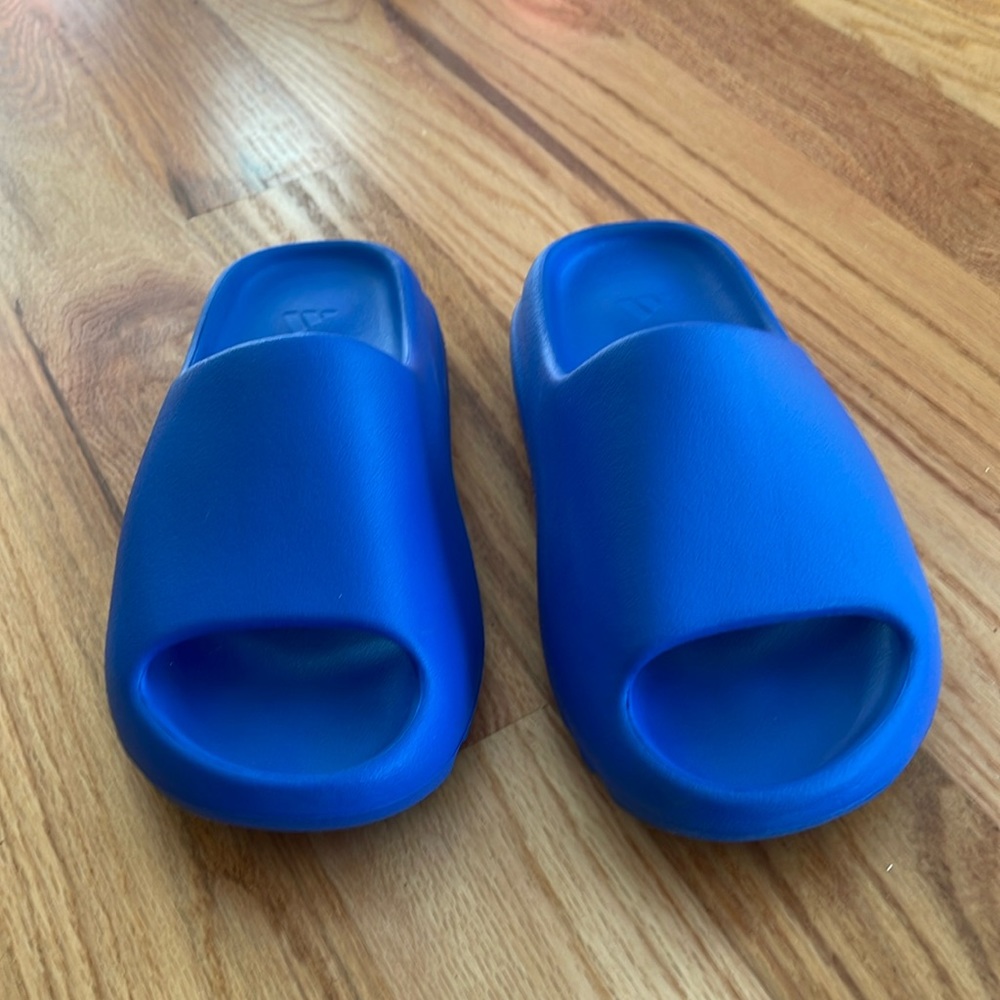 Yeezy slides. Brand new!! In the box. StockX verified. Size 5. Color azure.